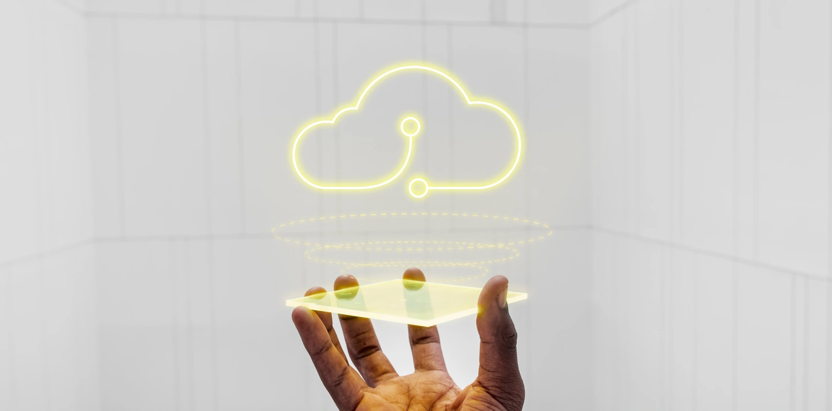 Hand holding a shiny cloud symbolizing advanced cloud technology and digital transformation.